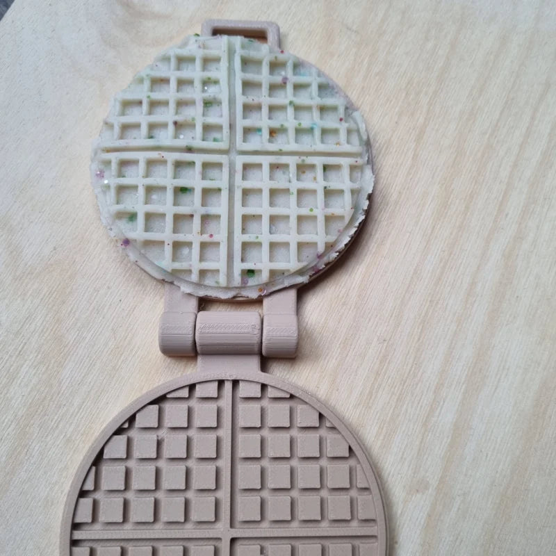 Kiddi Klei en zand mal wafels